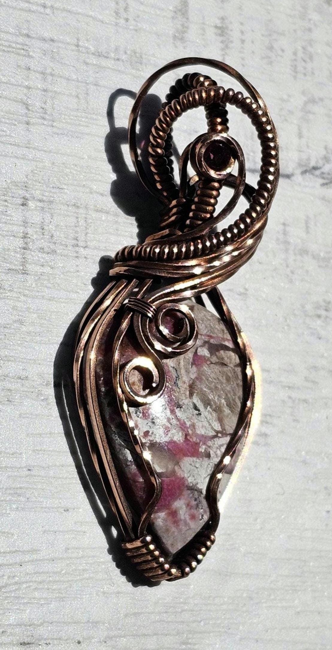 Cobaltian Calcite accented with a Raspberry Garnet, Hand Woven in Copper