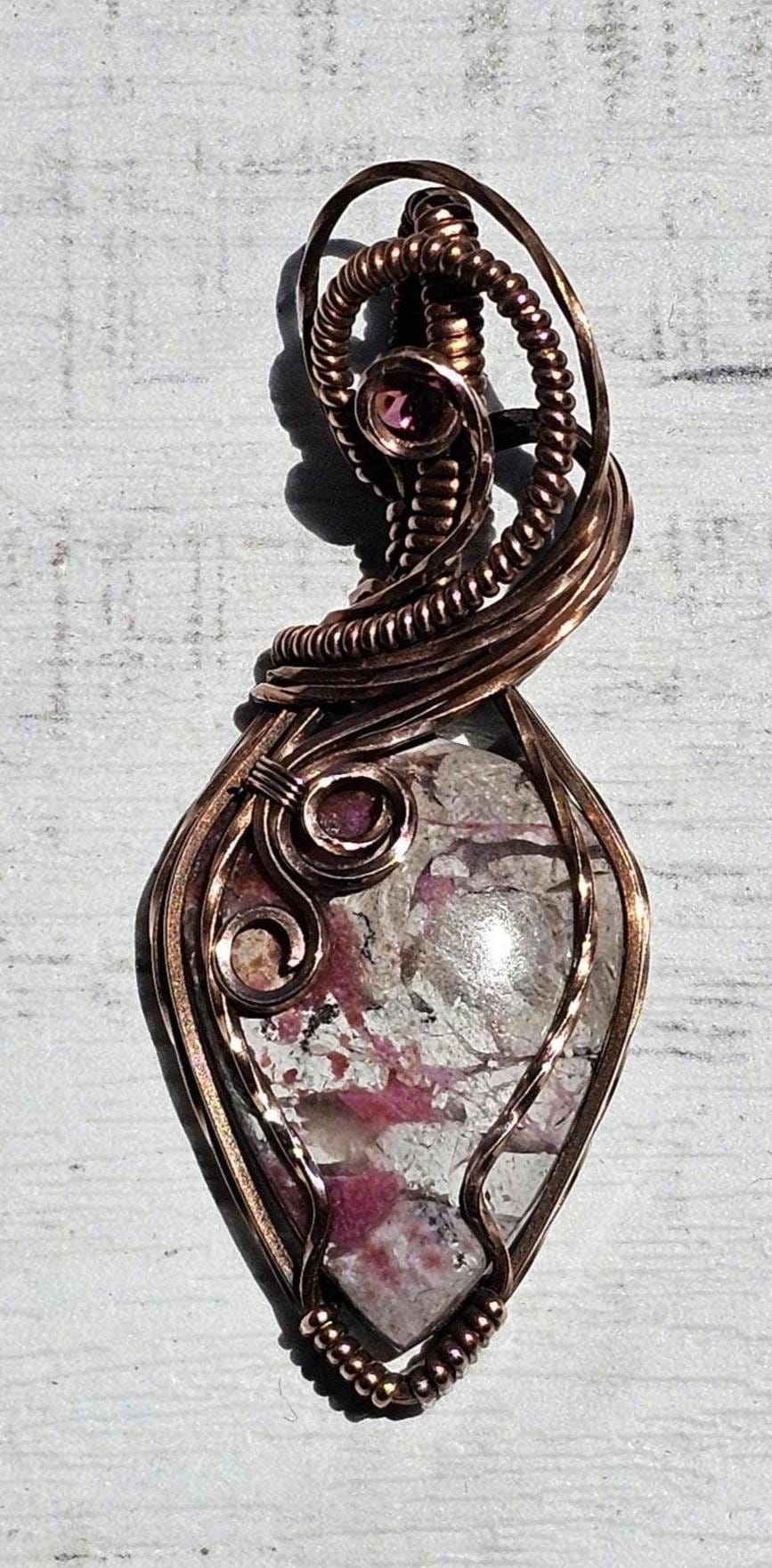 Cobaltian Calcite accented with a Raspberry Garnet, Hand Woven in Copper