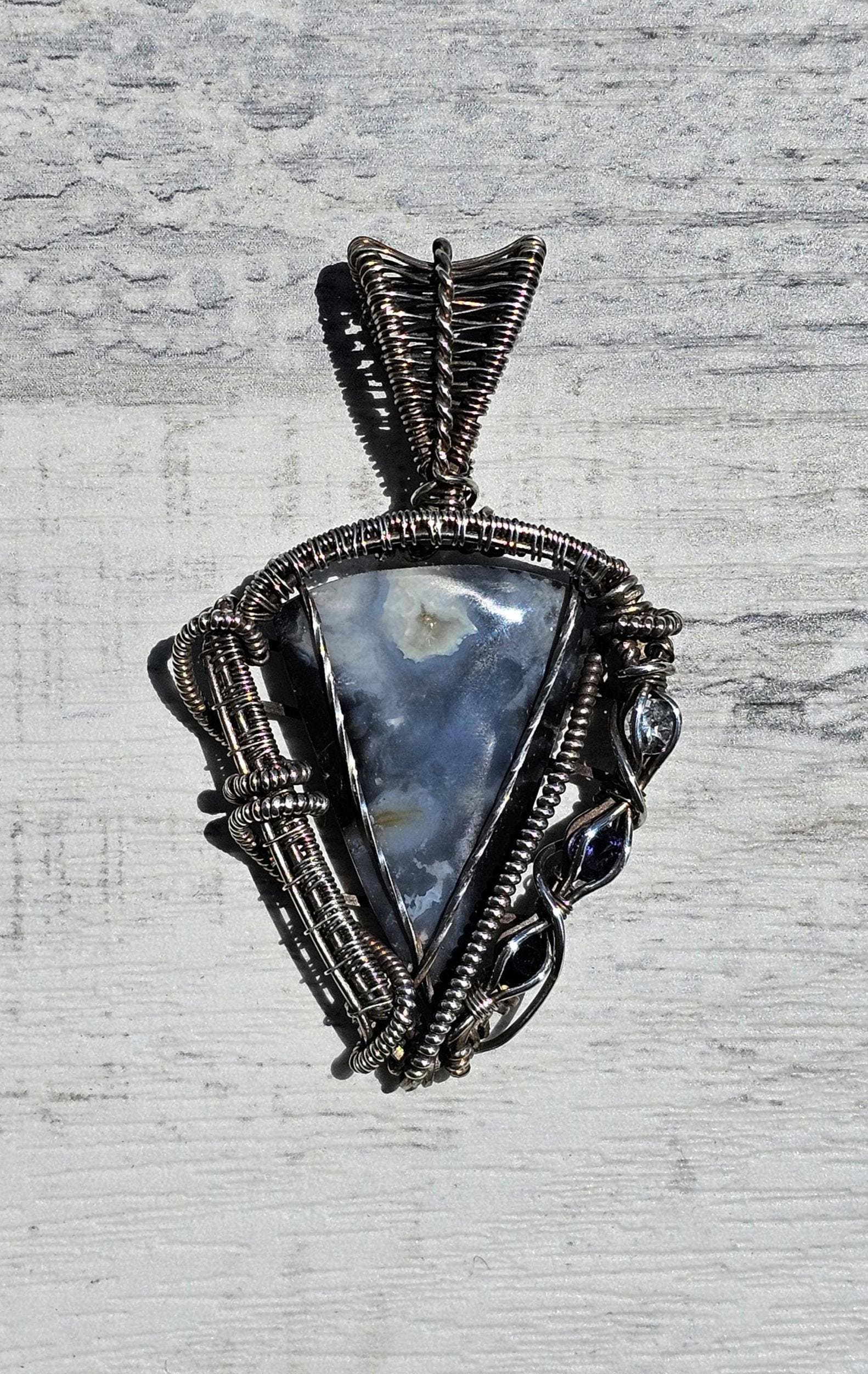 Stormy Plume Agate Pendant: Hand Woven Sterling Silver, Iolite & Onyx