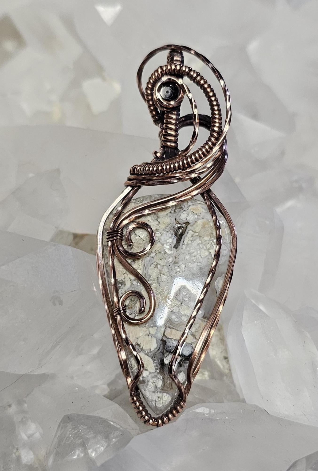 Brecciated Jasper, accented with a faceted onyx.