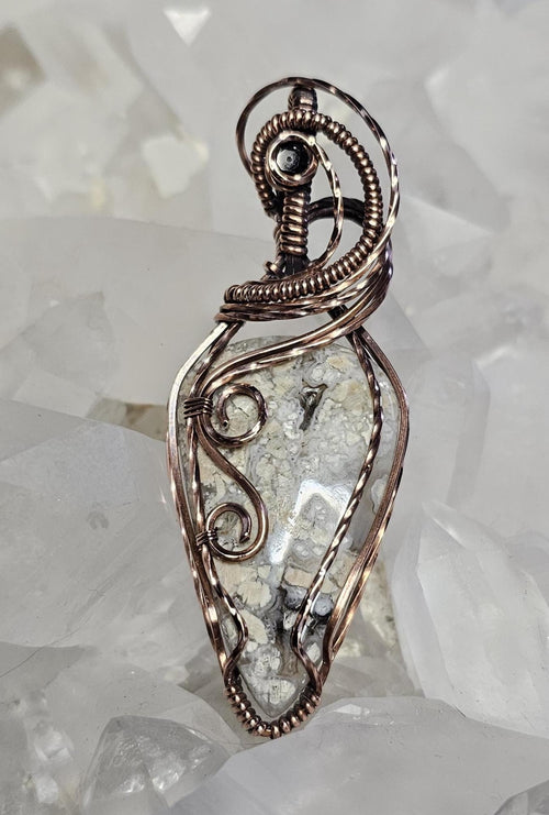 Brecciated Jasper, accented with a faceted onyx.