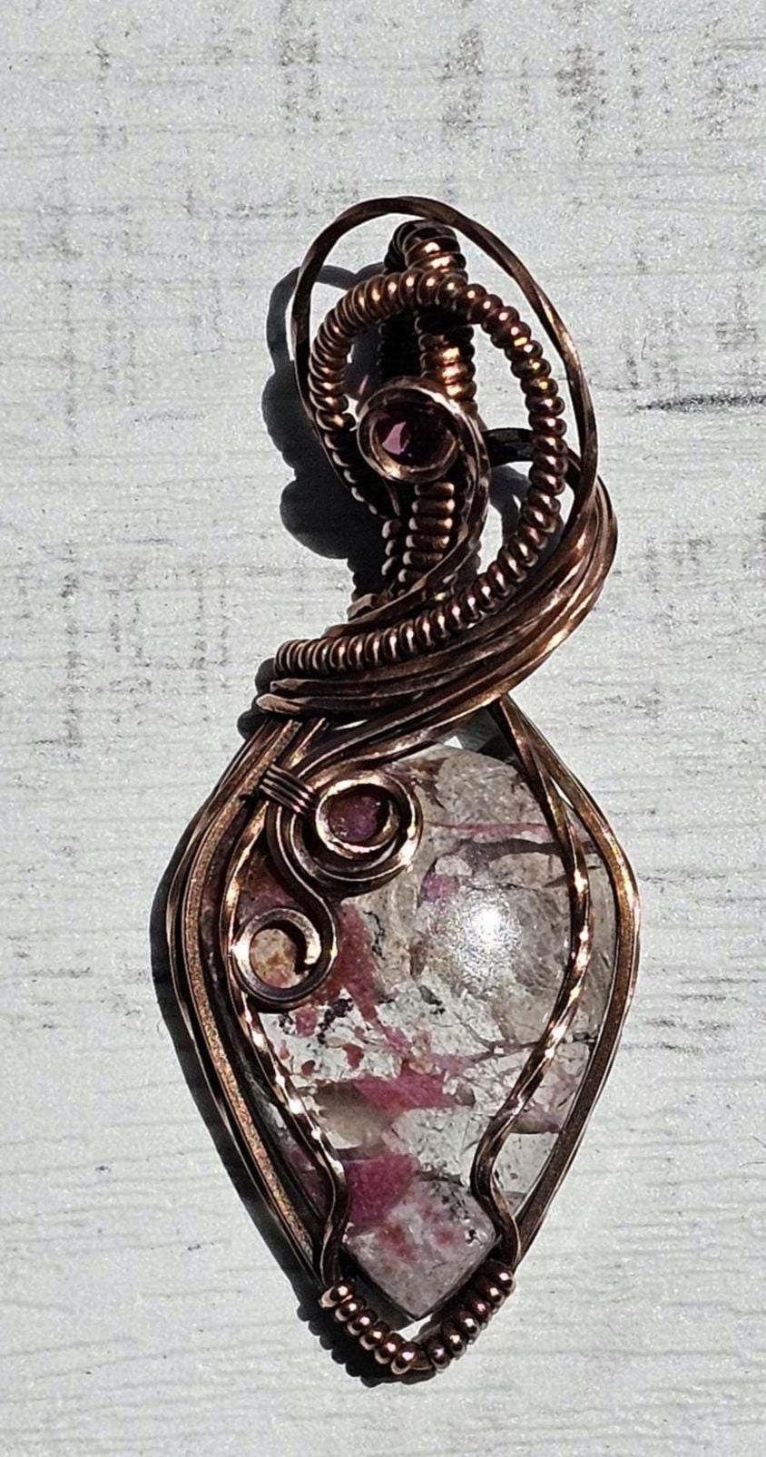 Cobaltian Calcite accented with a Raspberry Garnet, Hand Woven in Copper