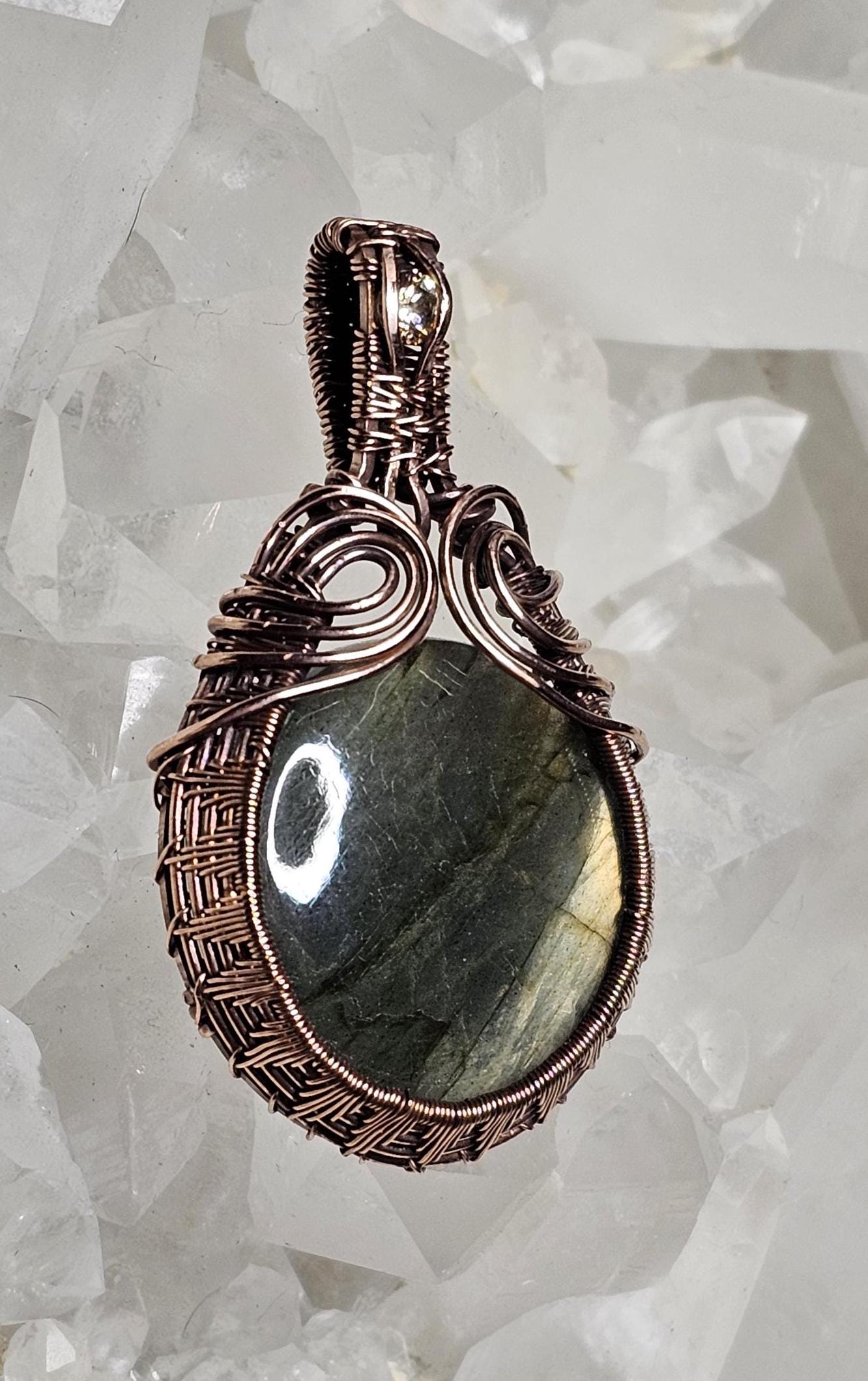 Labradorite wrapped in spun copper