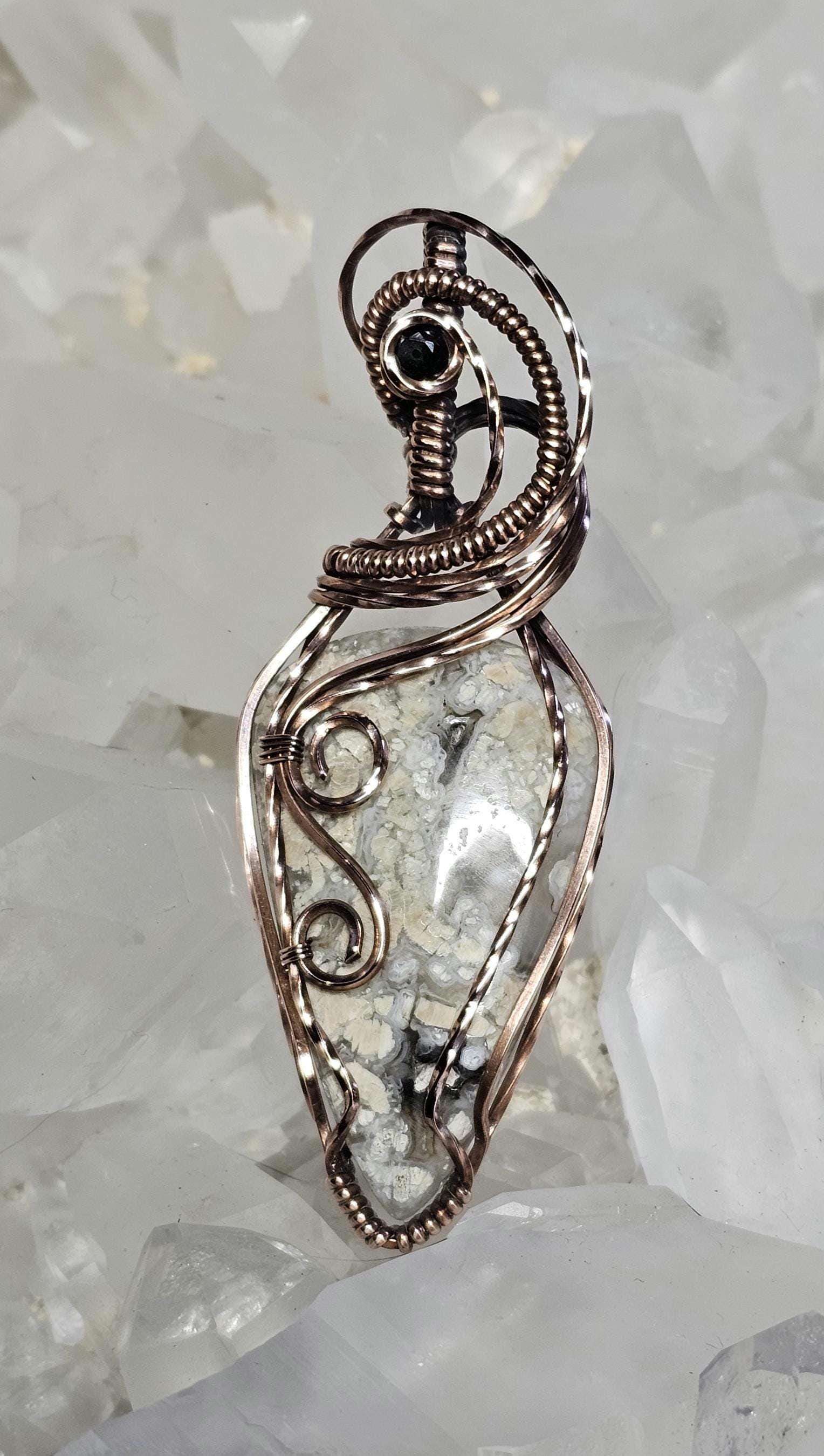 Brecciated Jasper, accented with a faceted onyx.