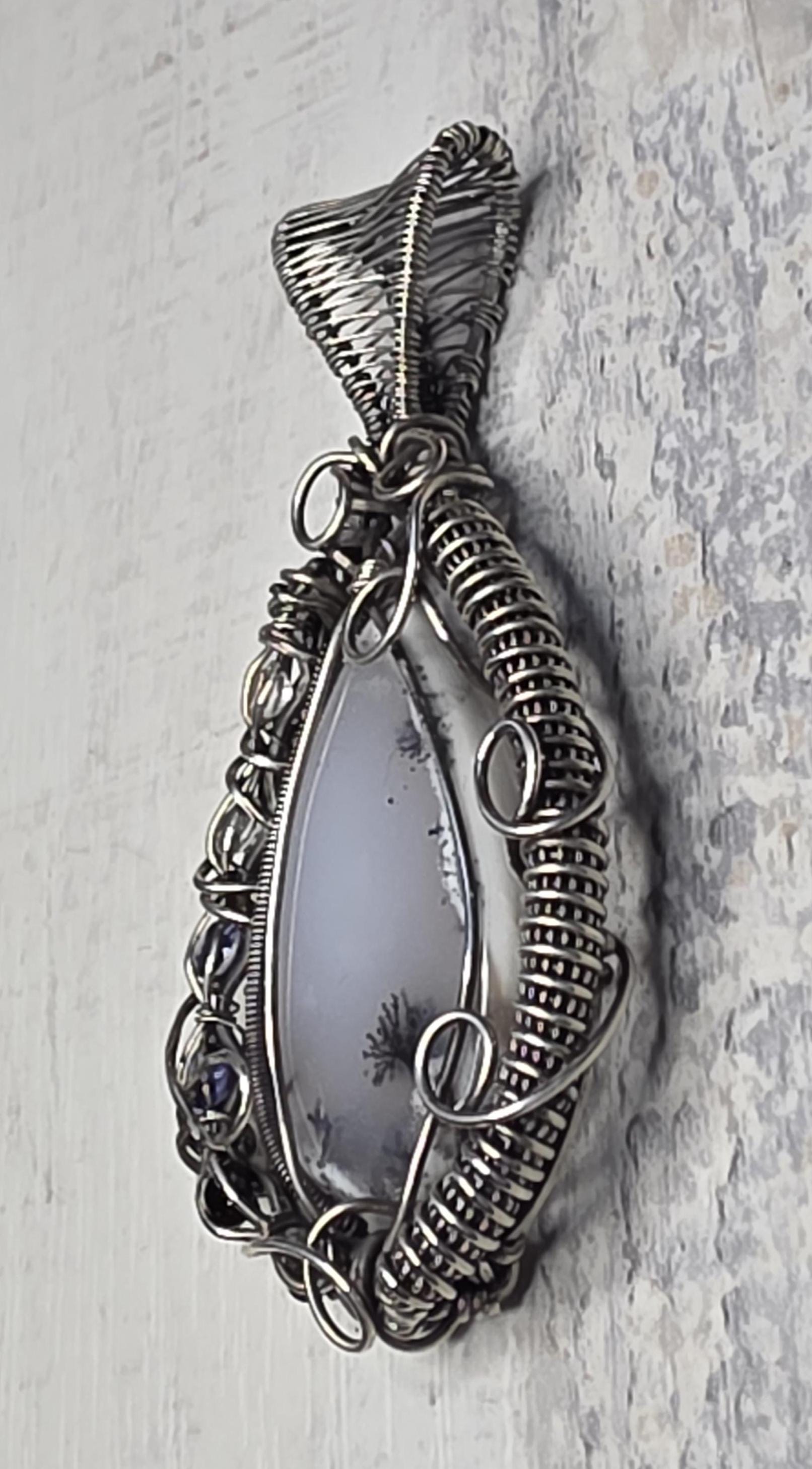 Merlinite Pendant: Hand Woven Sterling Silver, White Topaz Iolite & Onyx