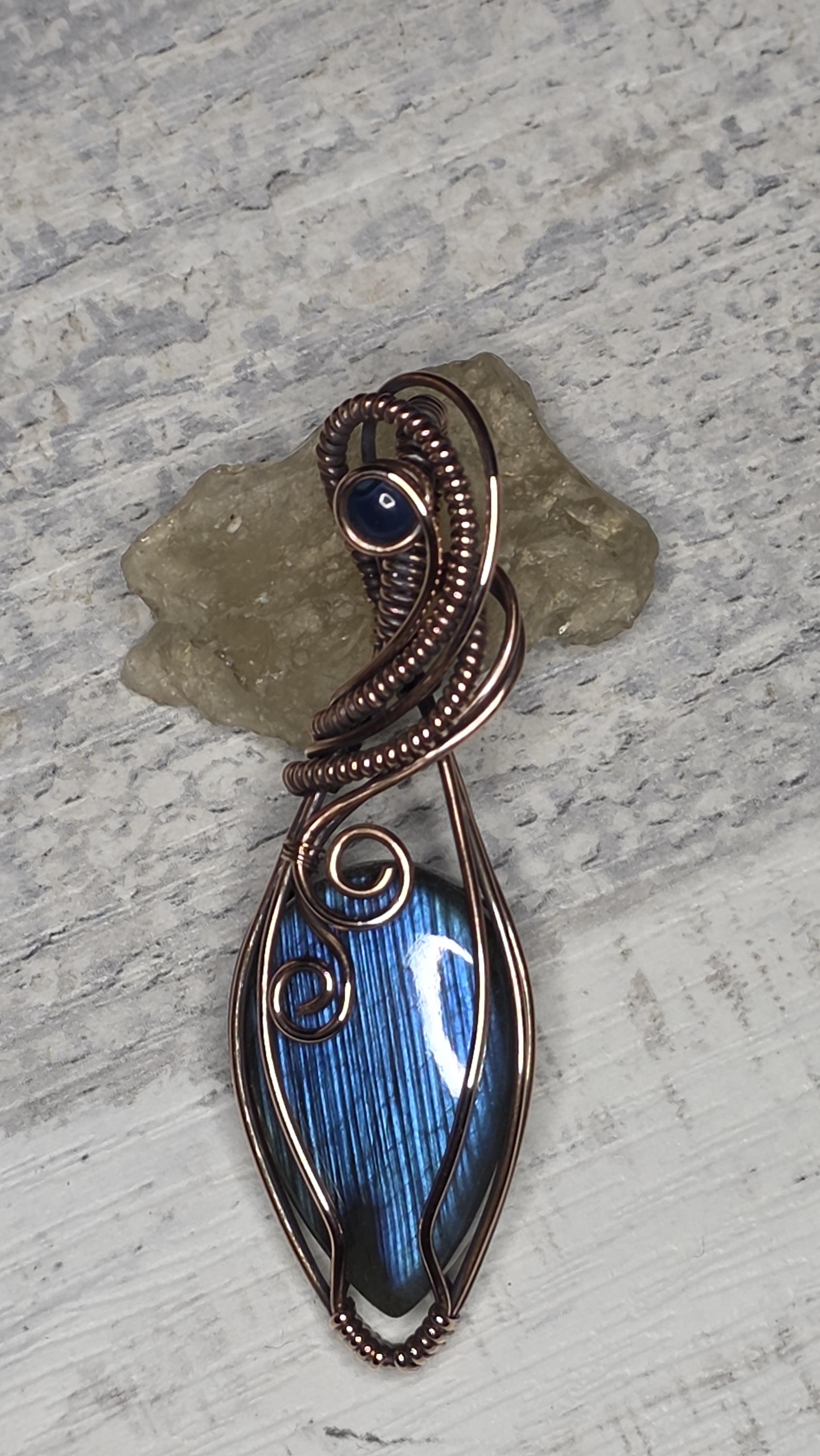 Hand Woven Copper Blue Labradorite Pendant accented with a smoked opal