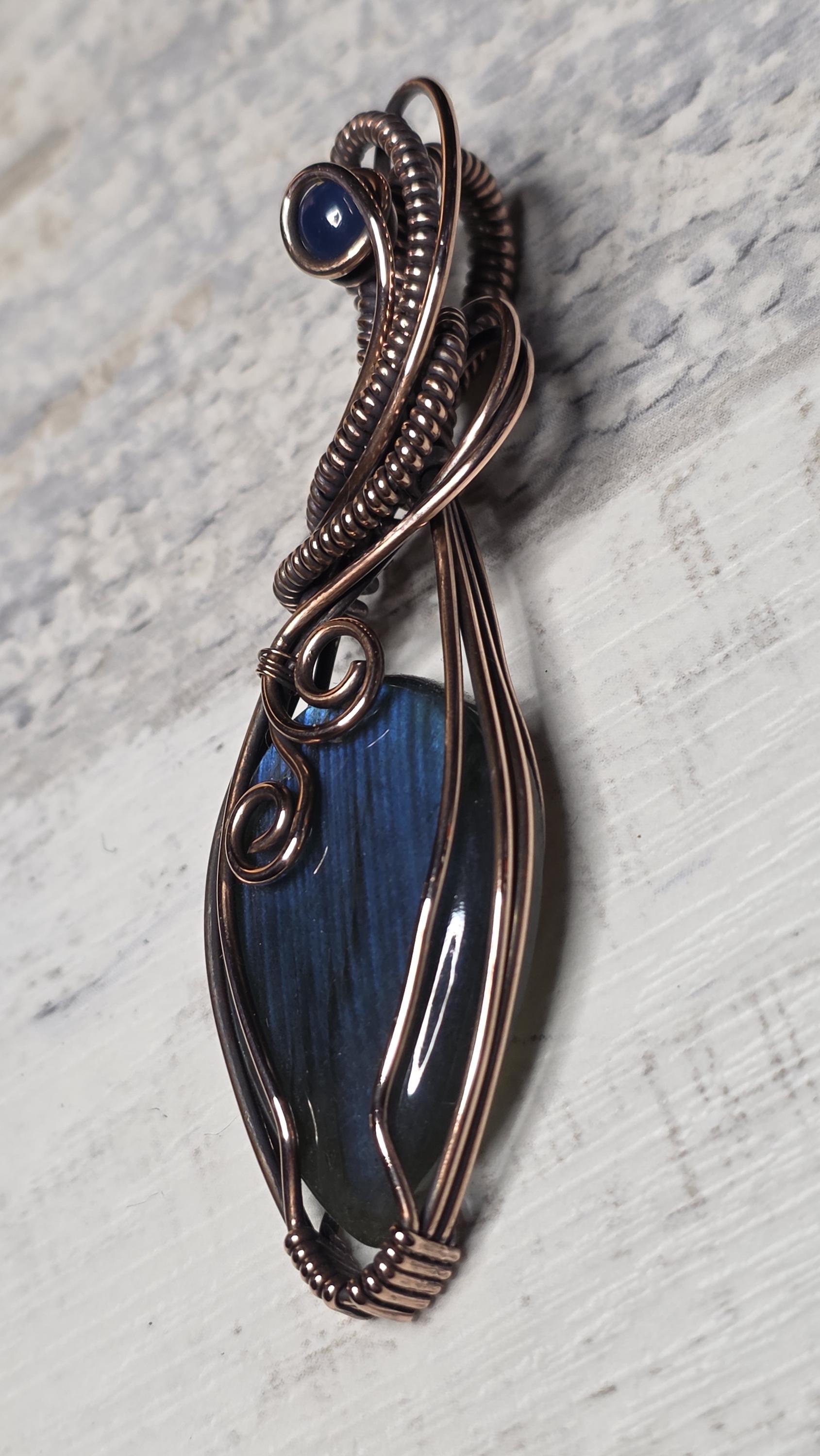 Hand Woven Copper Blue Labradorite Pendant accented with a smoked opal