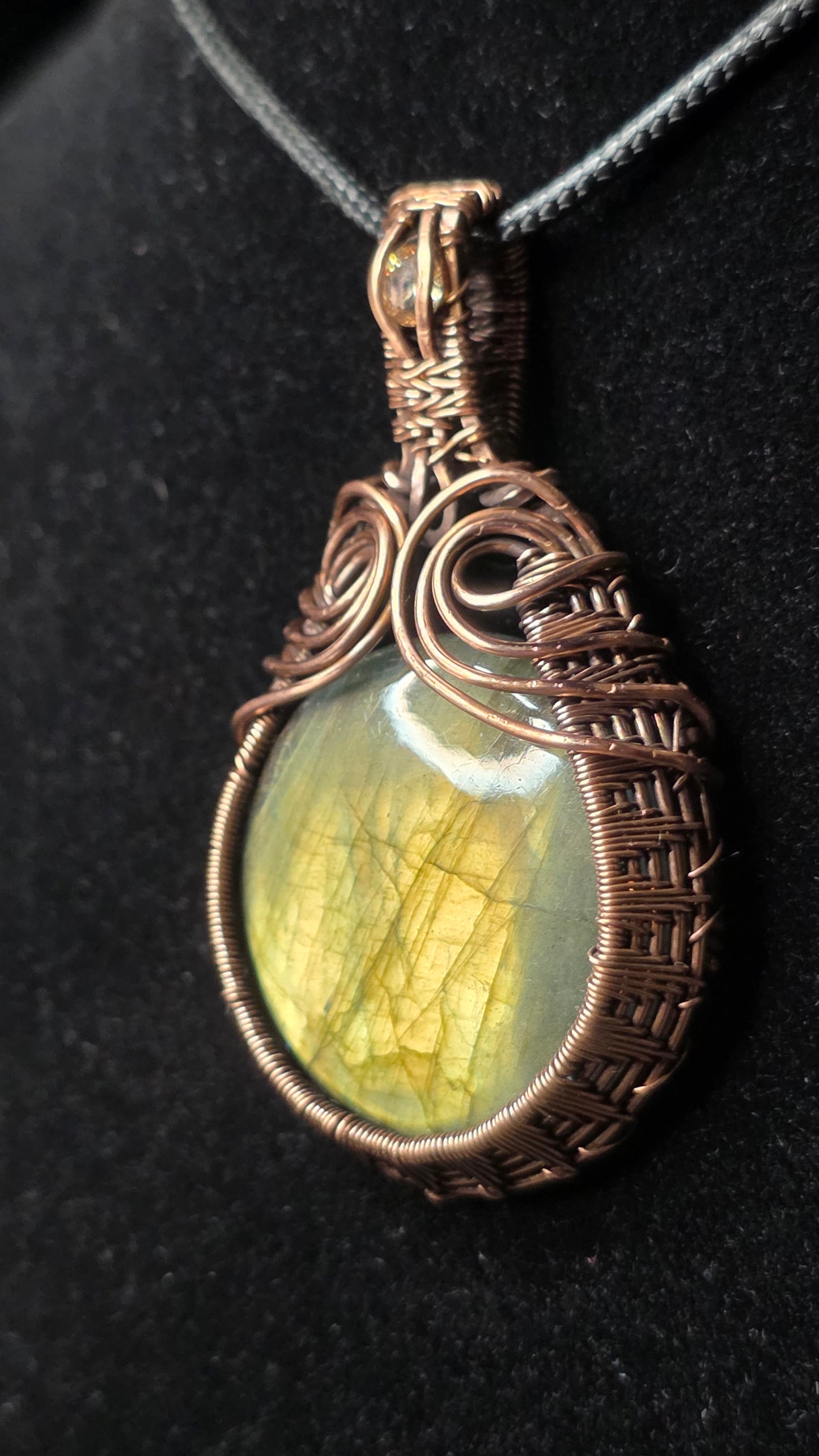 Labradorite wrapped in spun copper