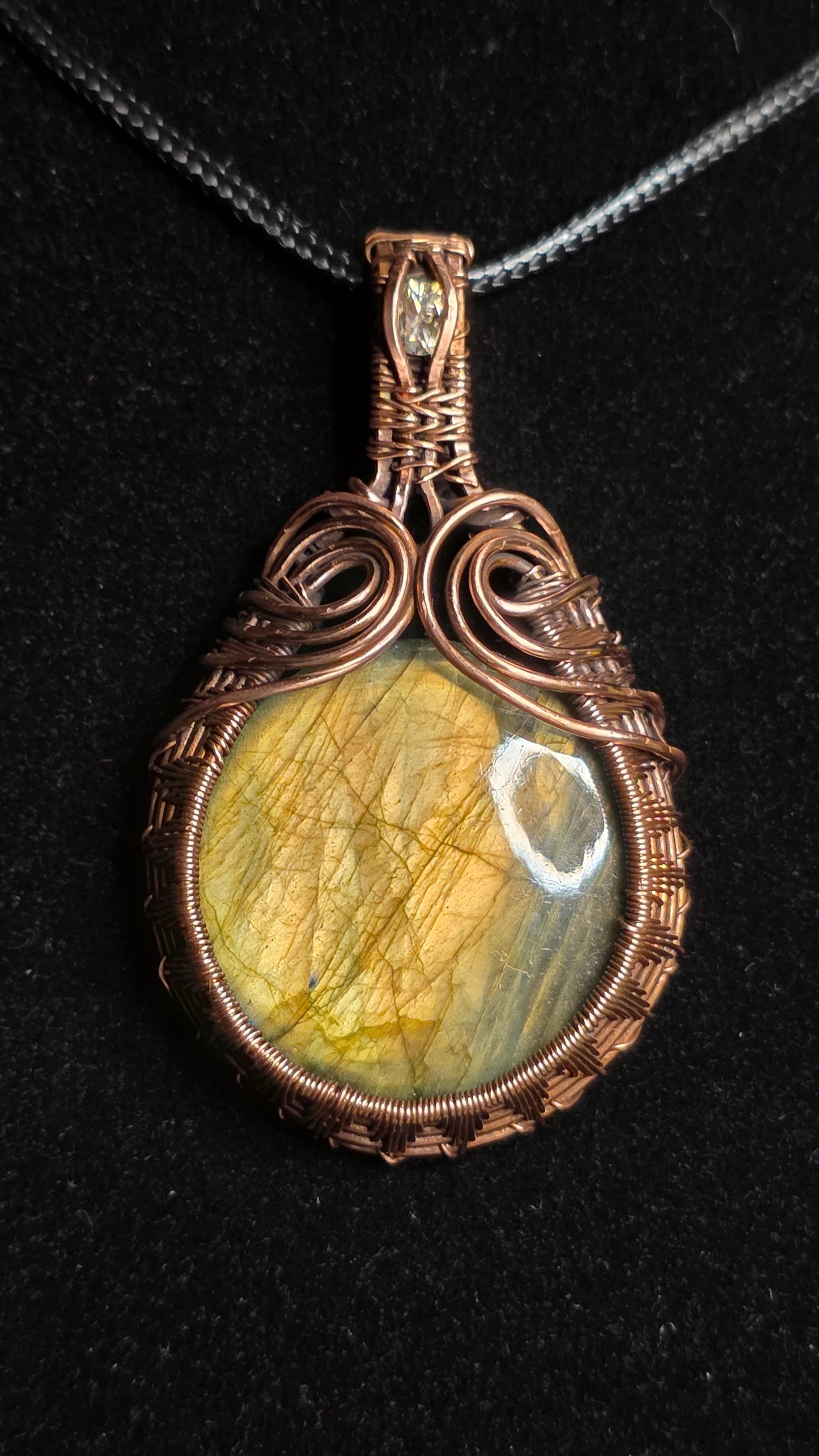 Labradorite wrapped in spun copper